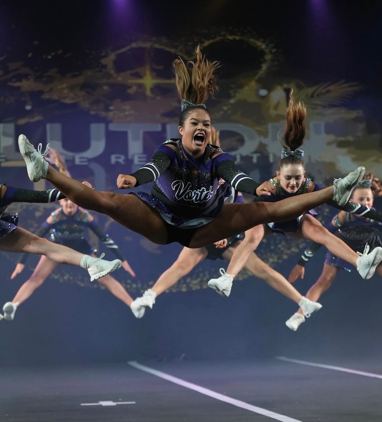 Vortex Cheer athletes performing at competition